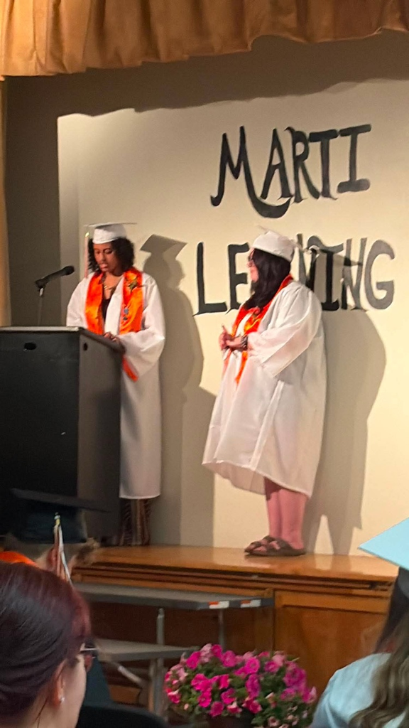 students on stage completing thank you speach