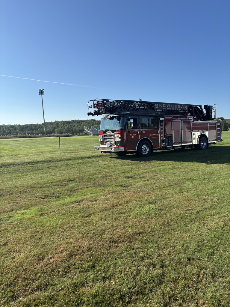 SFD ladder truck on field