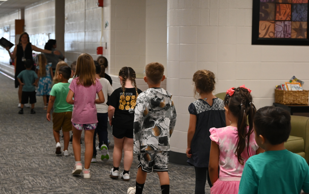 kids walking down hall