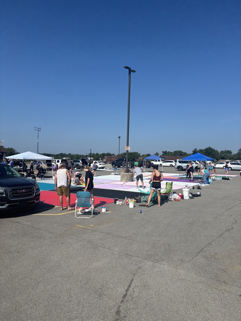 Kids painting parking spots