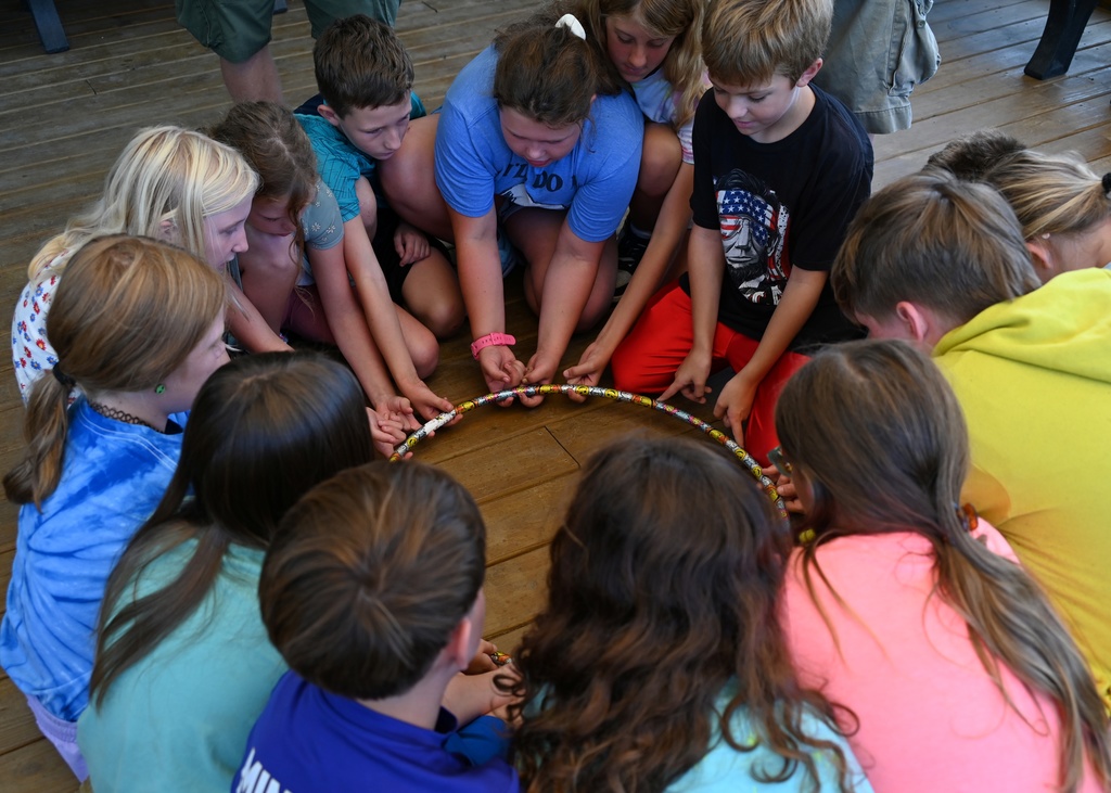 kids around a hula hoop