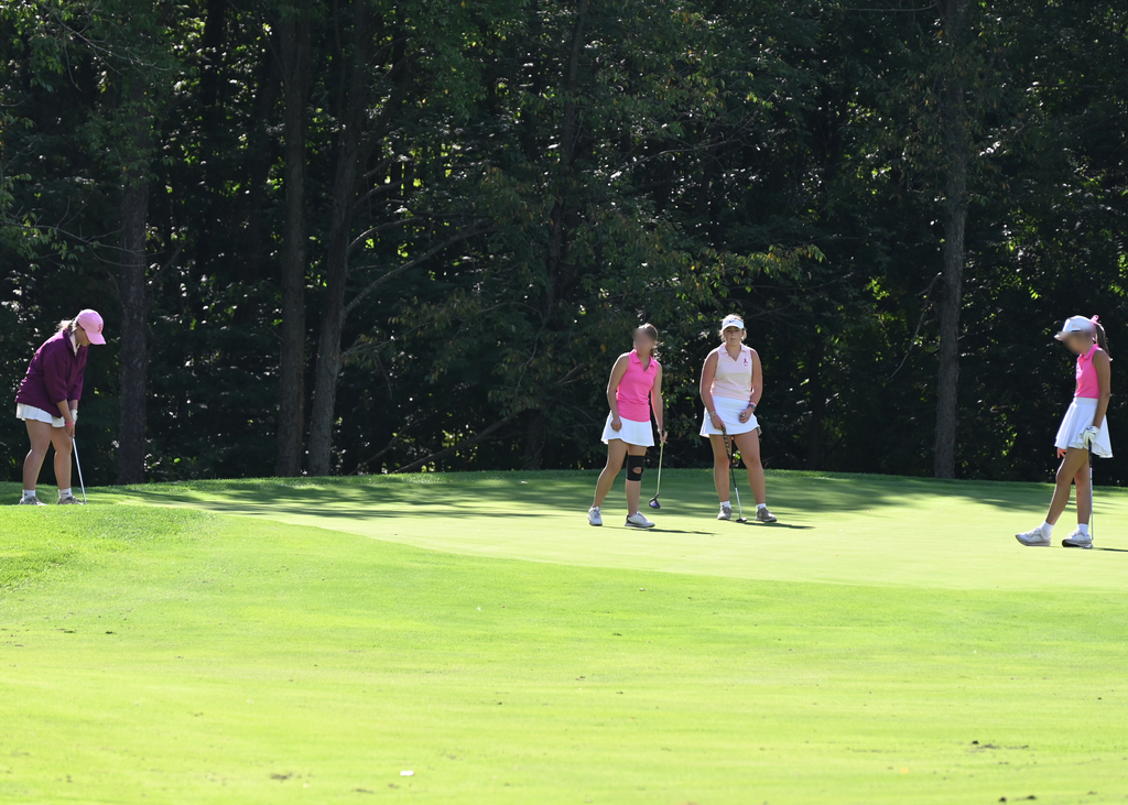 people on a golf cours