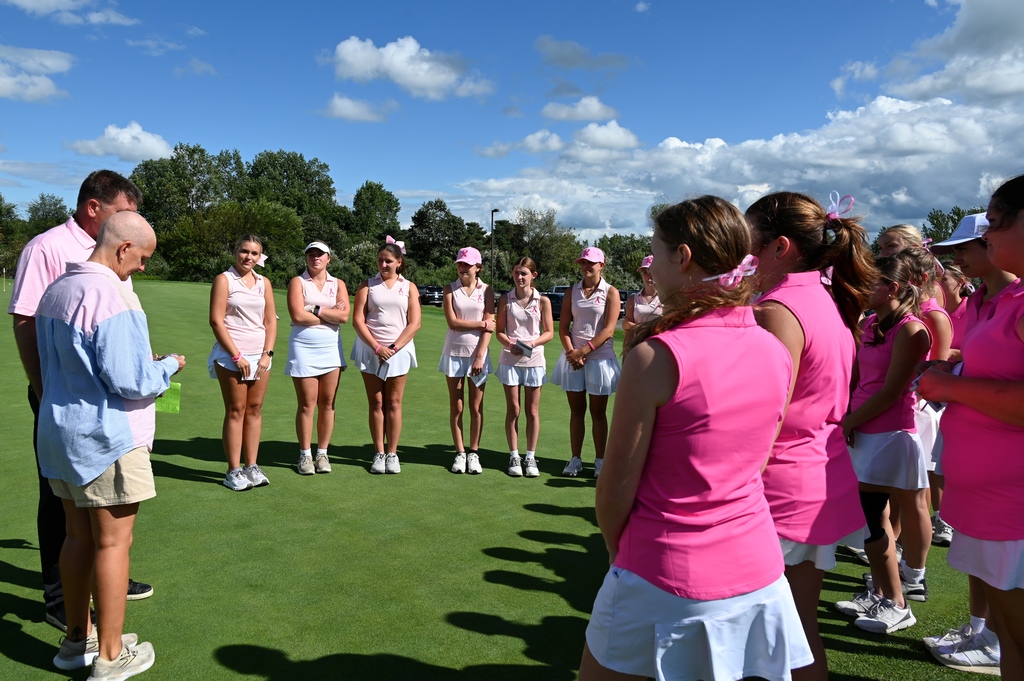 People in group on golf course