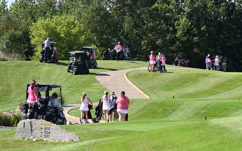 People on a golf course