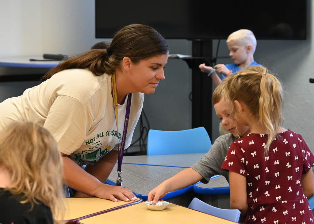 teacher talking to students