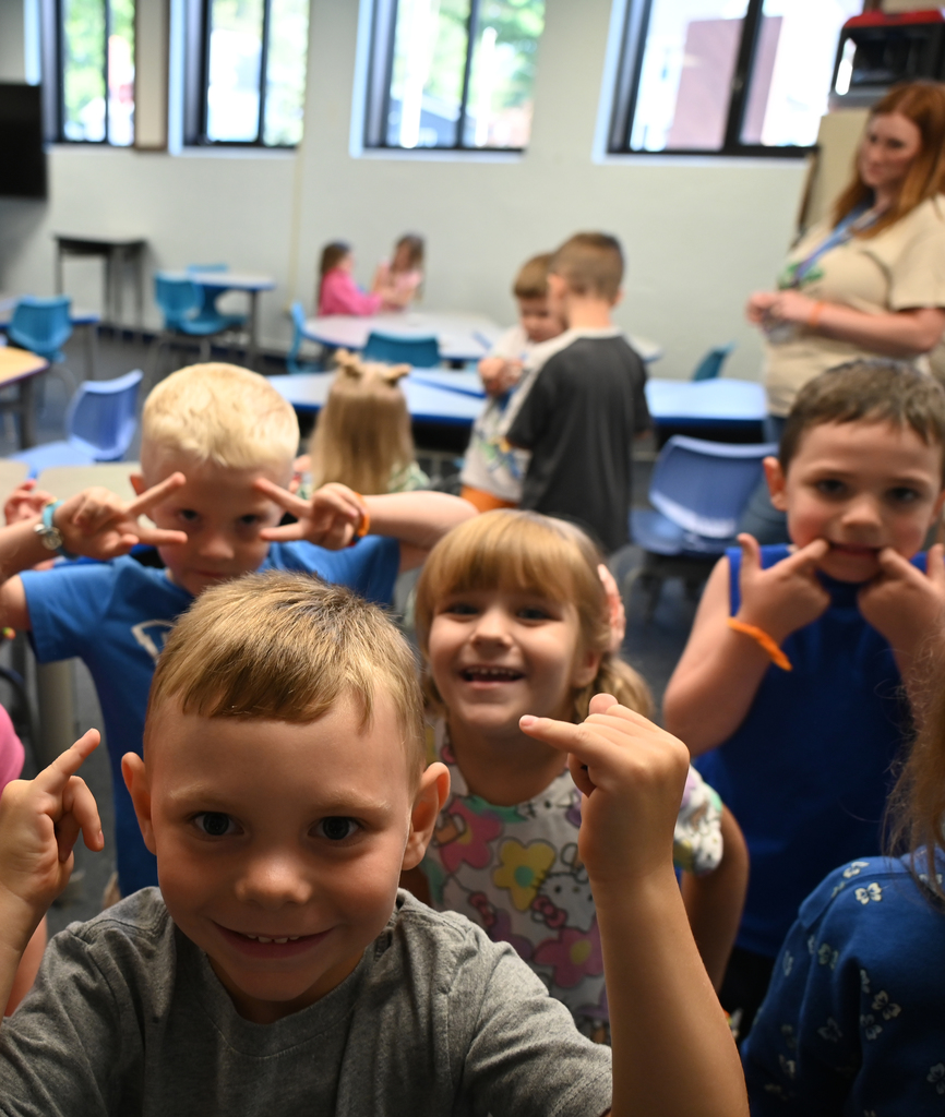 students making faces at camera