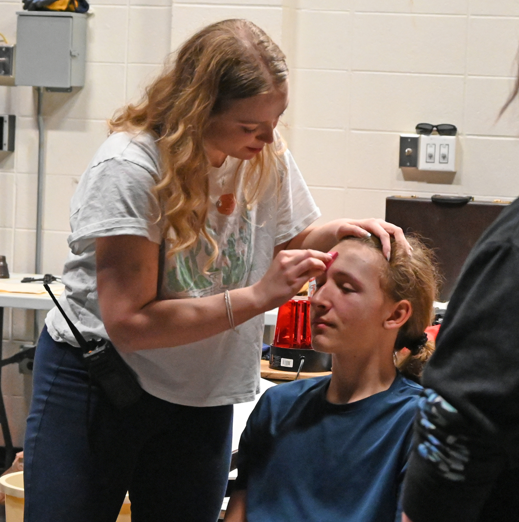 person getting makeup on