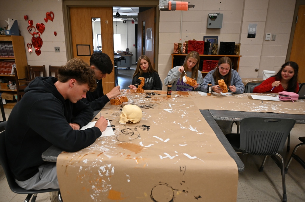 students doing sculptures