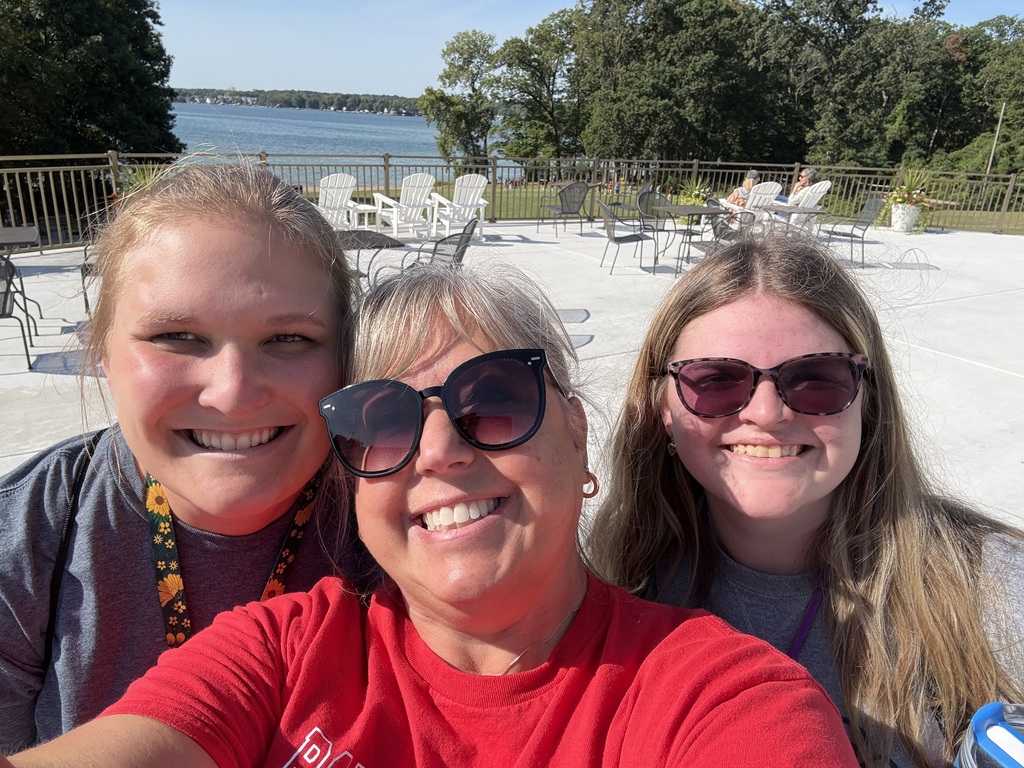 three woman smiling at camera