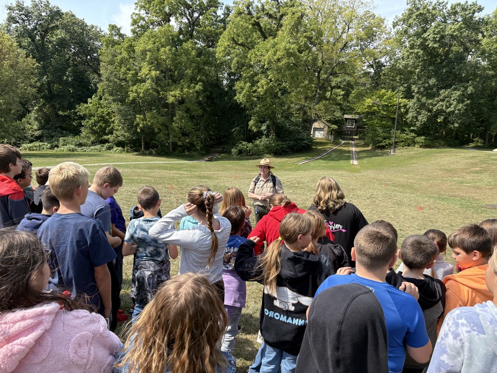 Students learning from park ranger