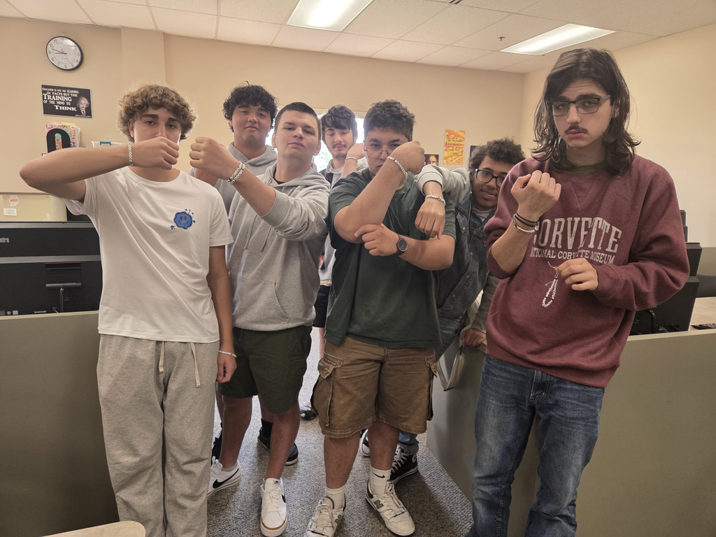 students with binary bracelets