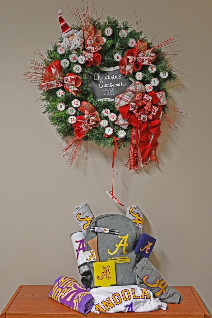 christmas wreath and backpack full of angola gear