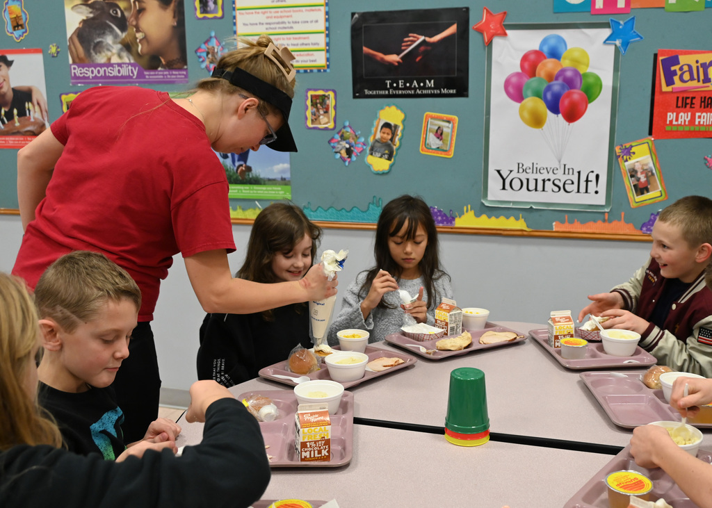 students eating in a cafeteria