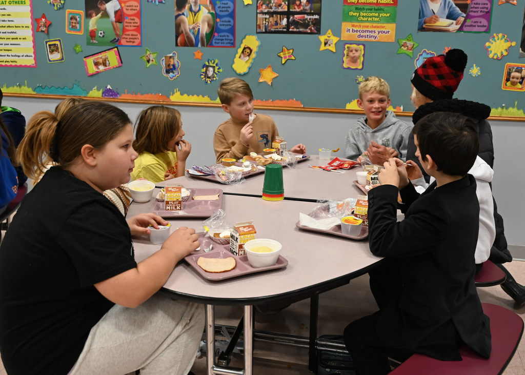 students eating in a cafeteria