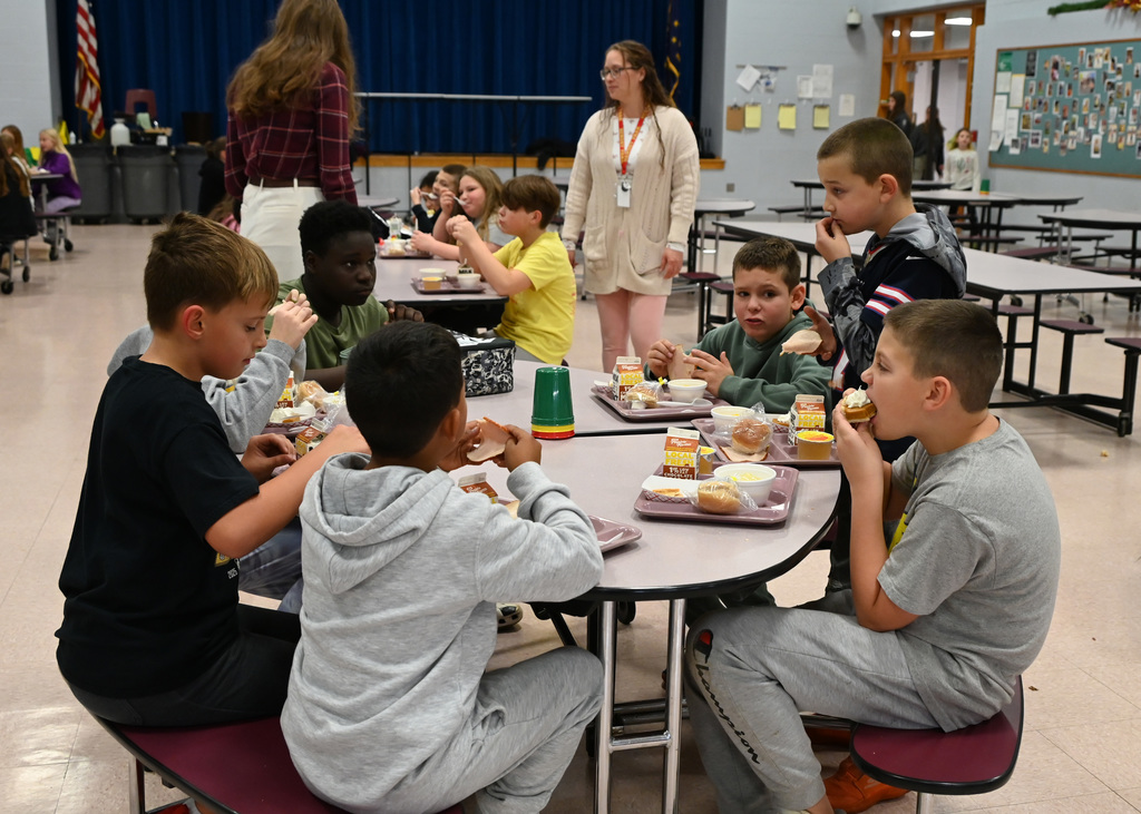 students eating in a cafeteria