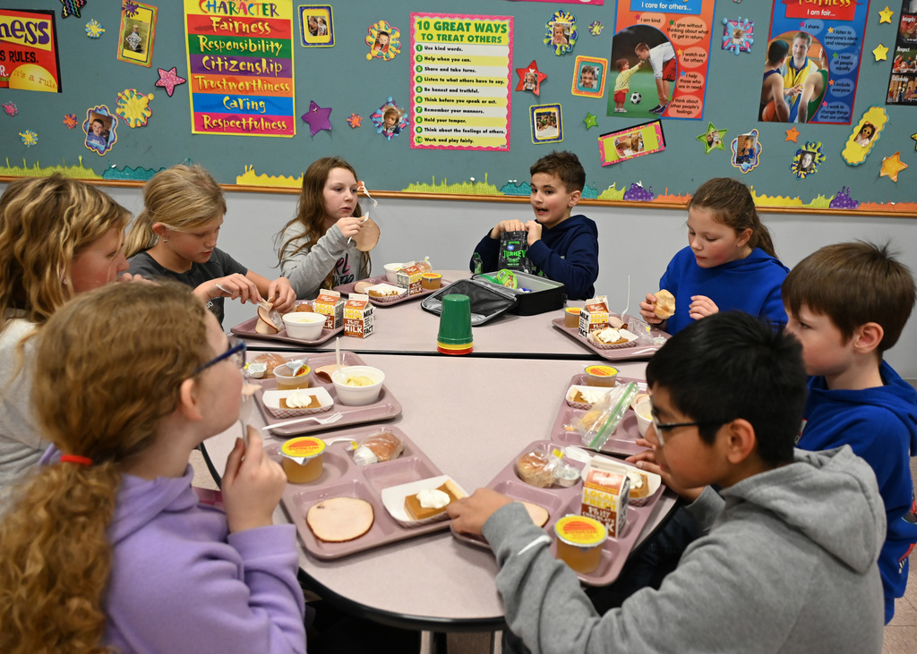 students eating in a cafeteria