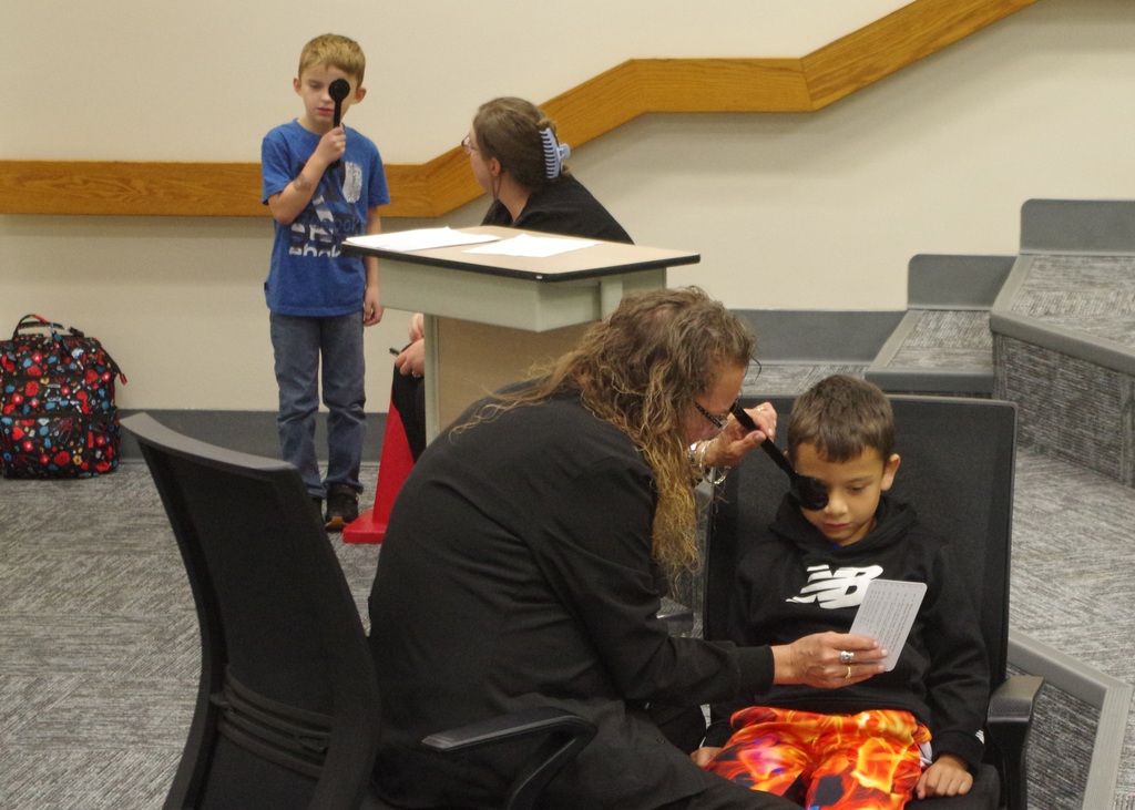 childern geting eye exams