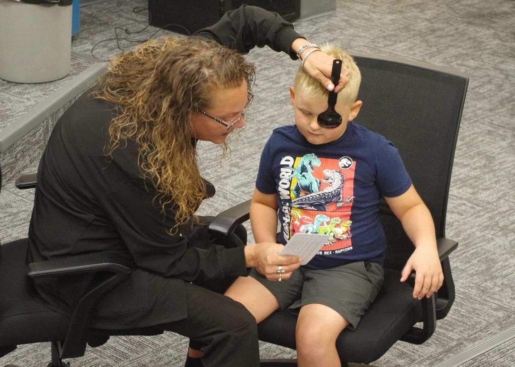 child getting eye exam