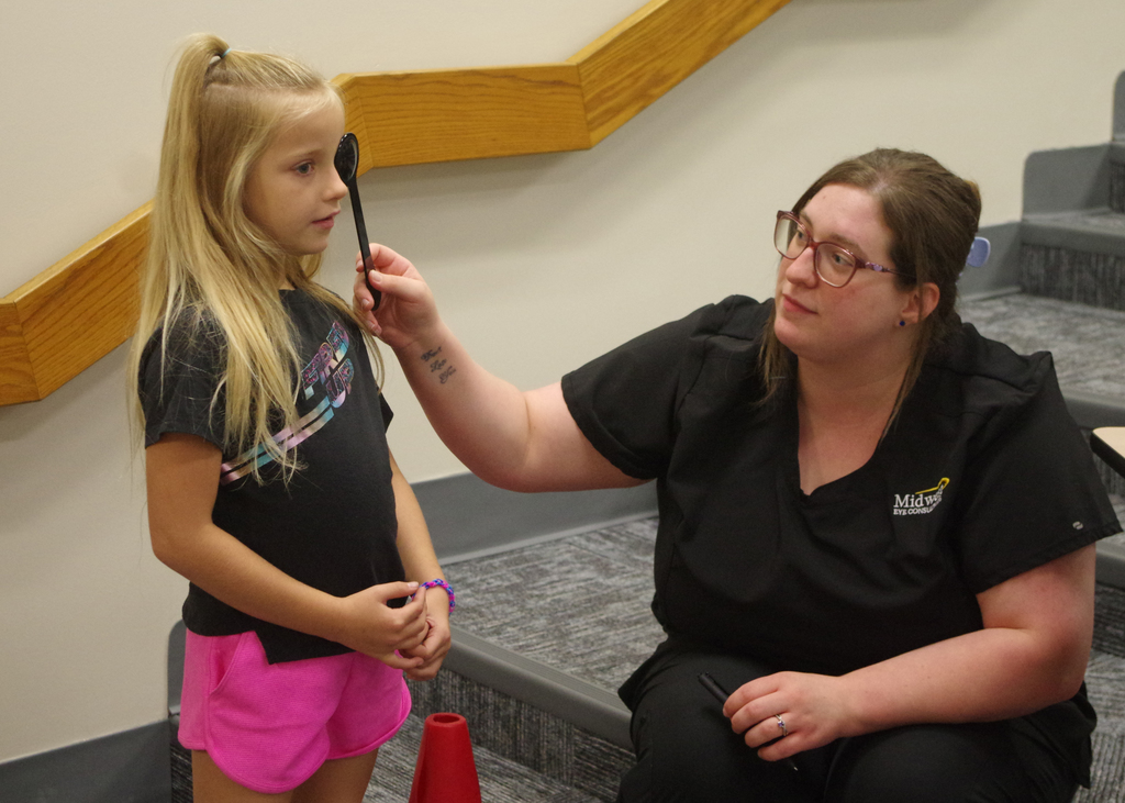 child getting eye exam