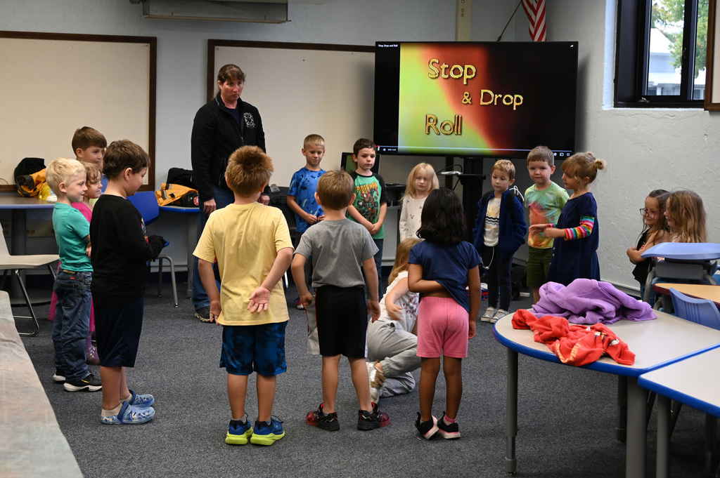 Class room of student learning stop drop and roll