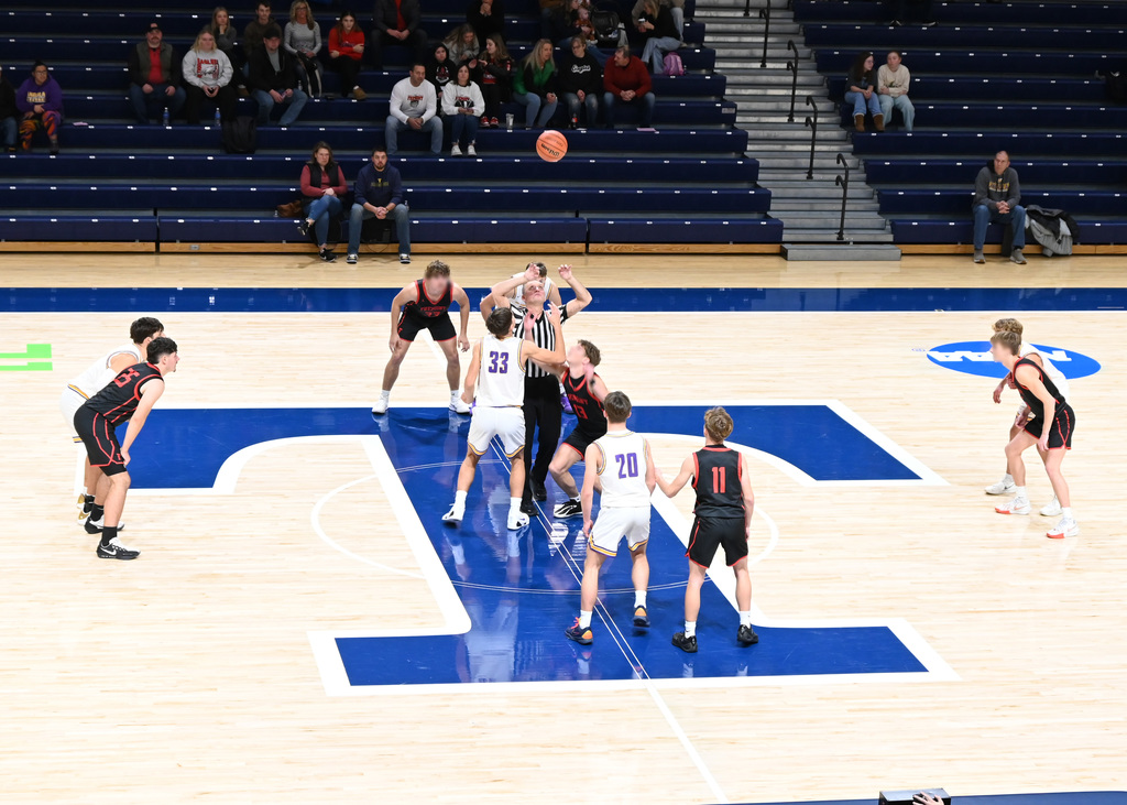 jump ball in basketball game 