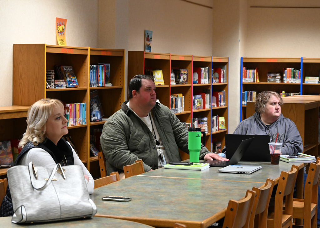 people sitting around tables