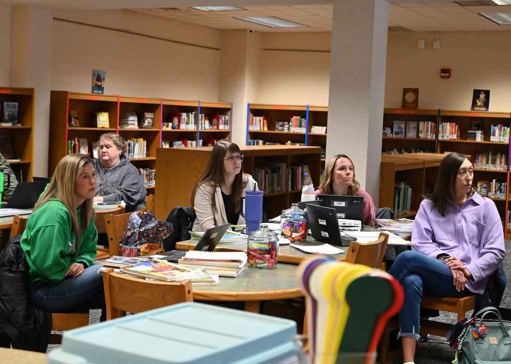 people sitting around tables