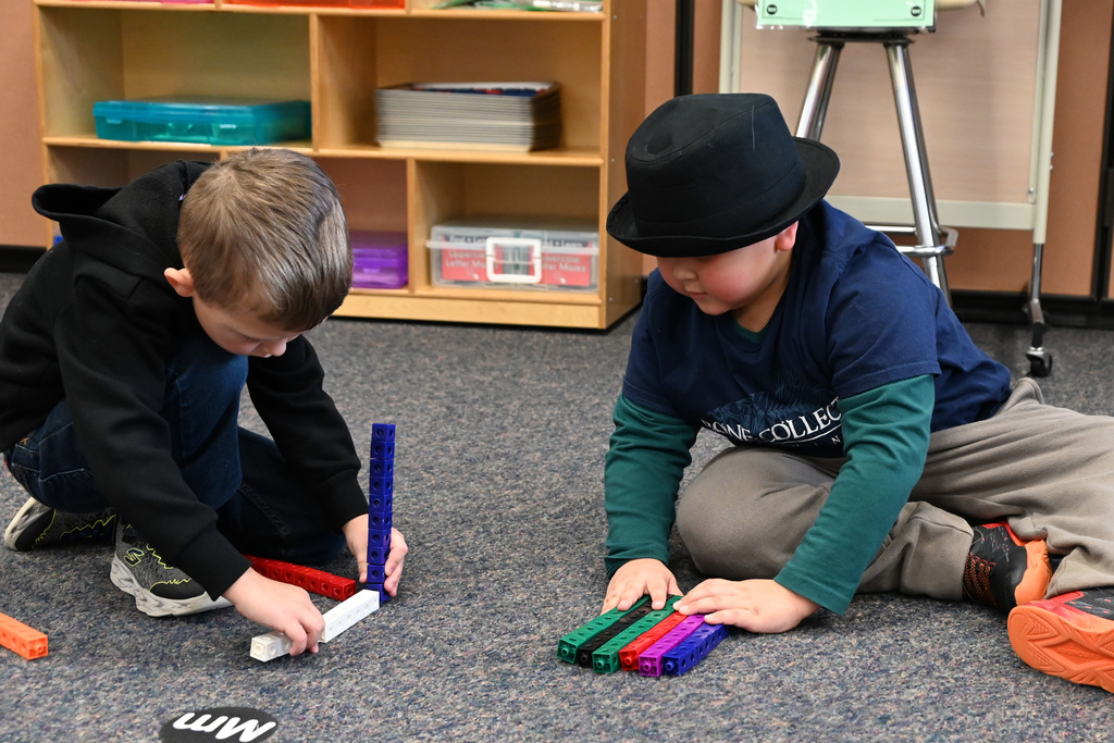 tow boys playing with blocks