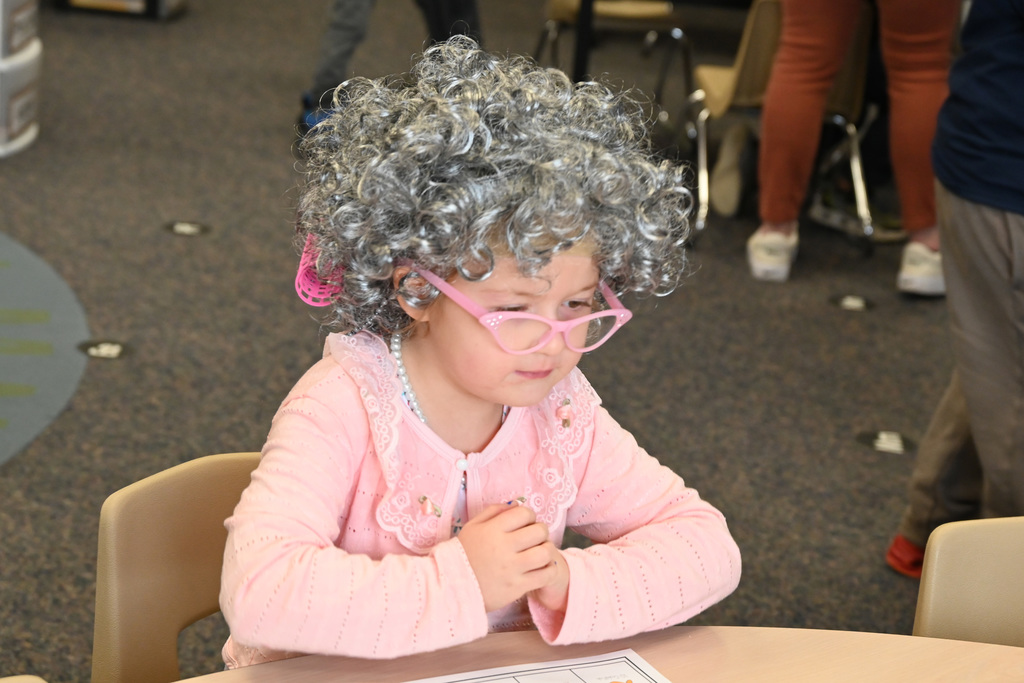 Child dressed as old woman