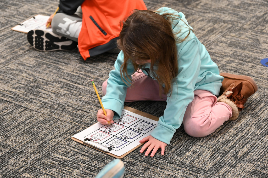 girl working on paper