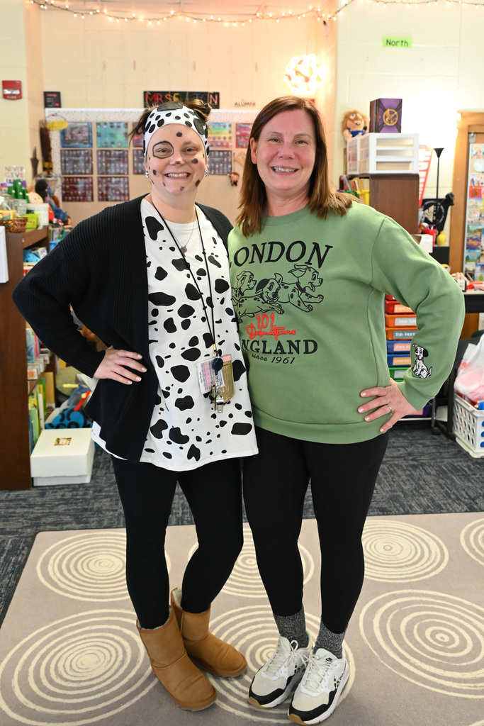 two women dressed up for 101 dalmations