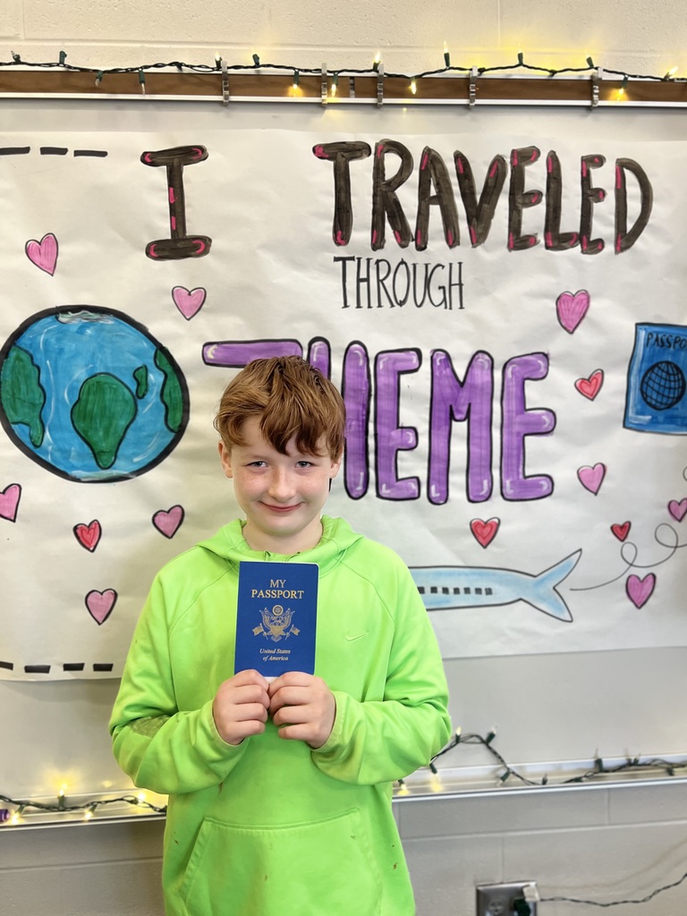 boy holding a passport