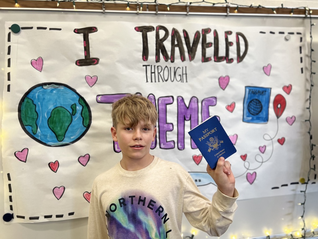 boy holding a passport