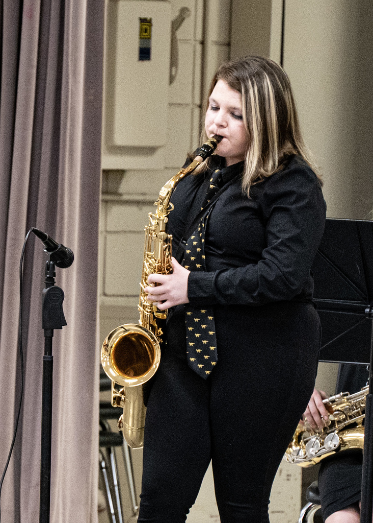 Girl playing saxaphone