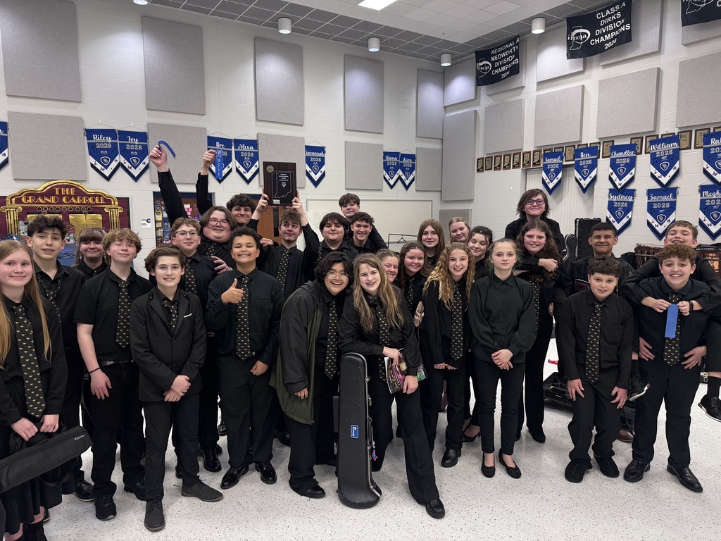 large group of middle schoolers dressed in black for a Jazz band competition