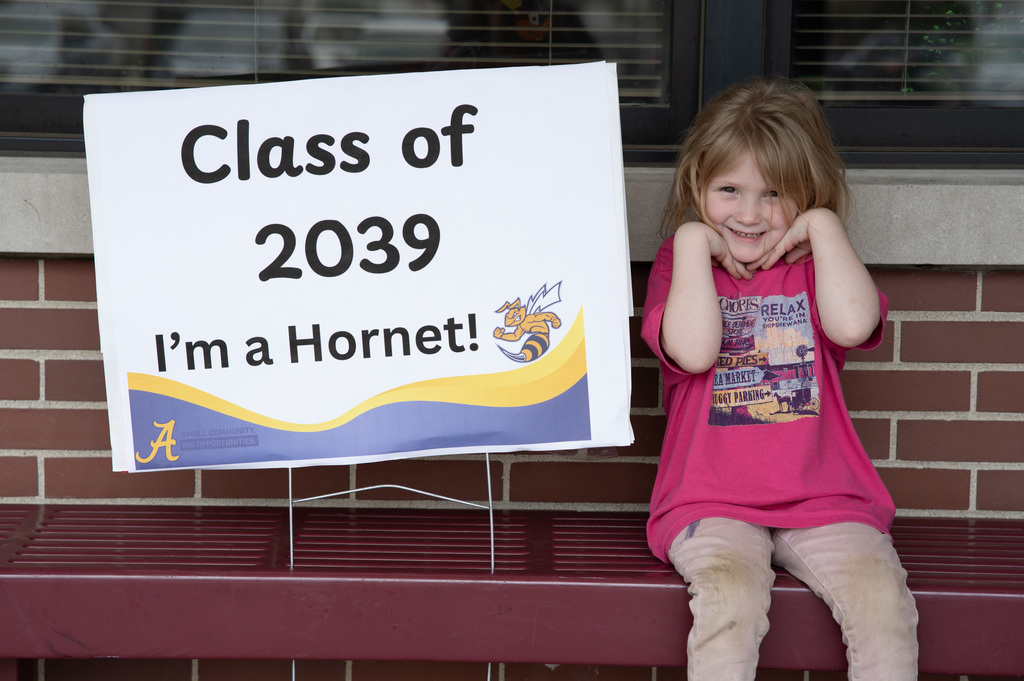 Little girl with Class of 2039 sign