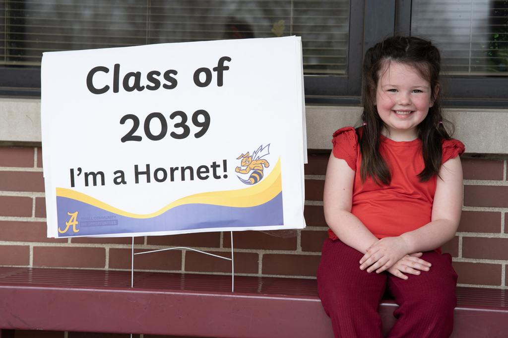 Little girl with Class of 2039 sign