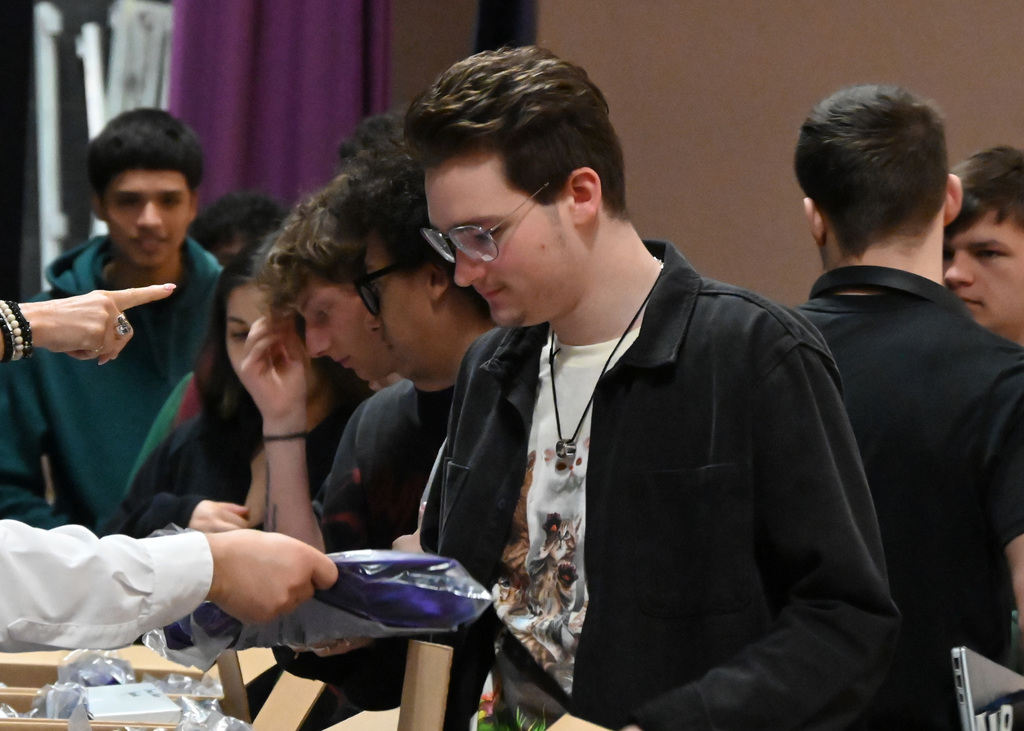 Line of students getting packages