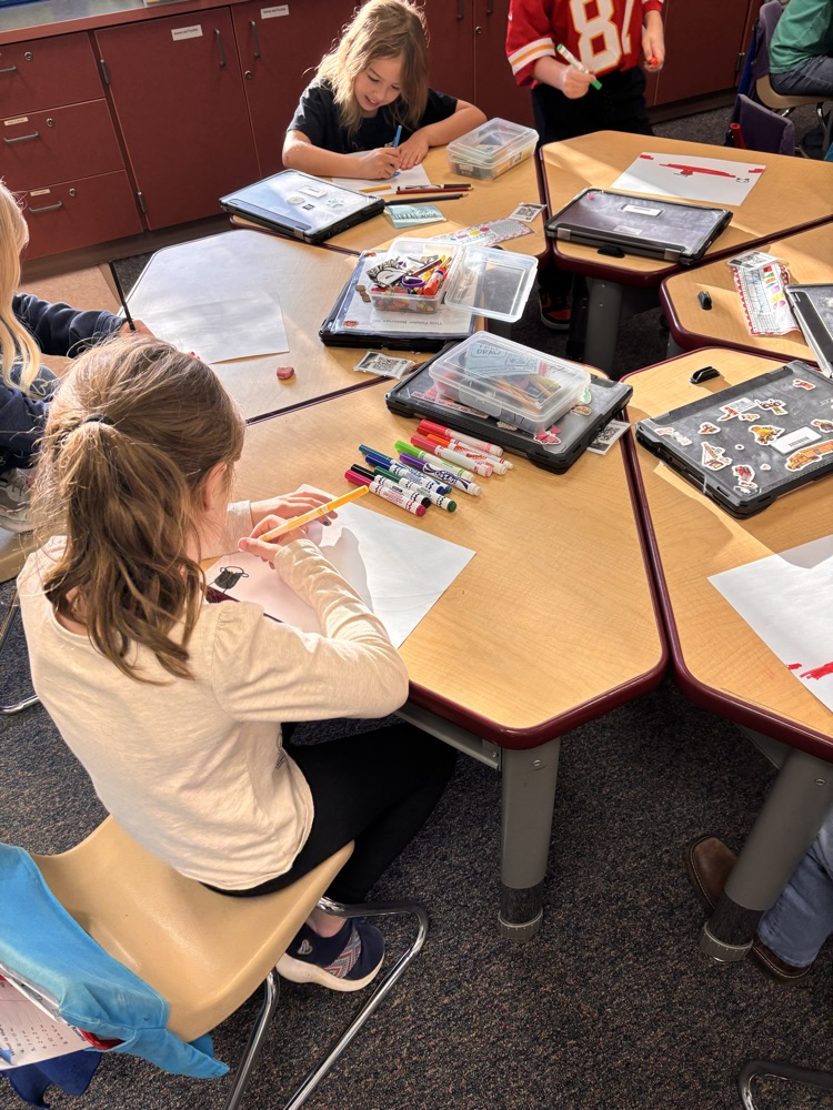 Child writing at a desk