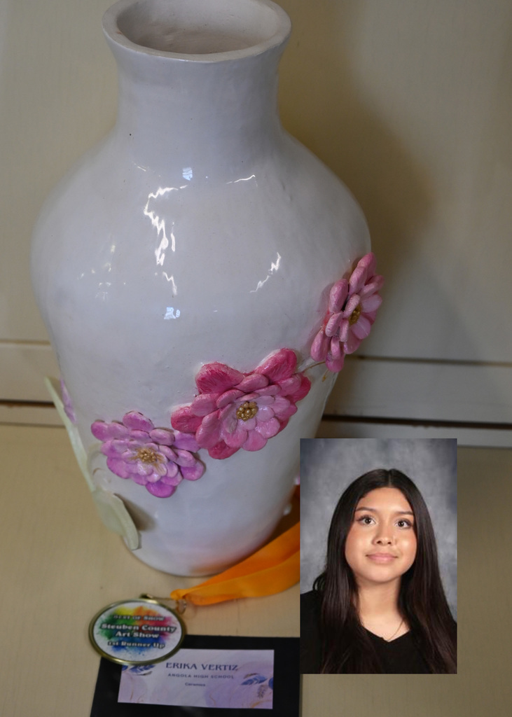 Clay white pot with pink flowers, runner up medal, image of artist