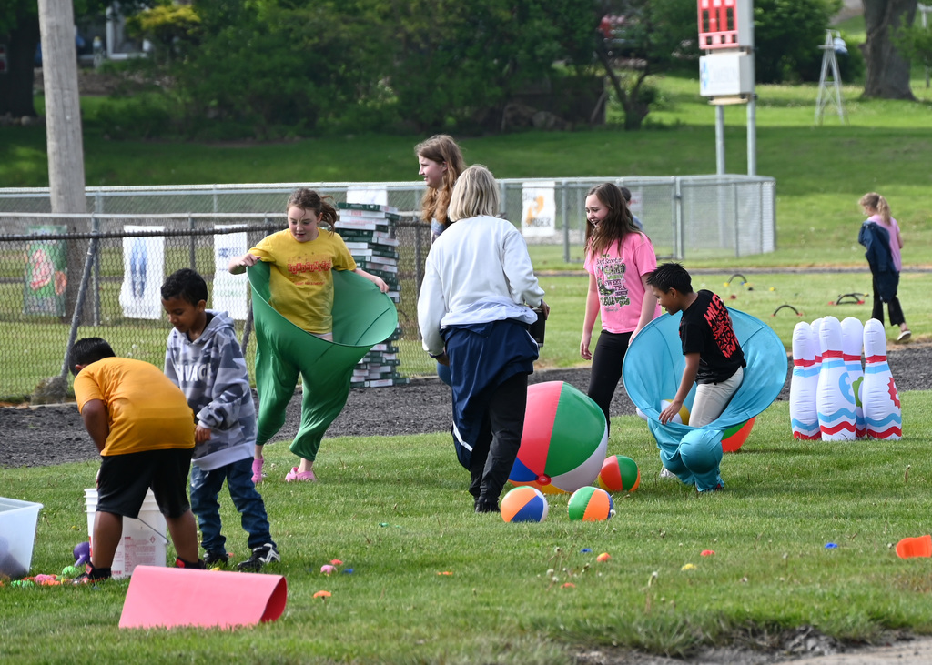 a group of 4th grade students playing with balls