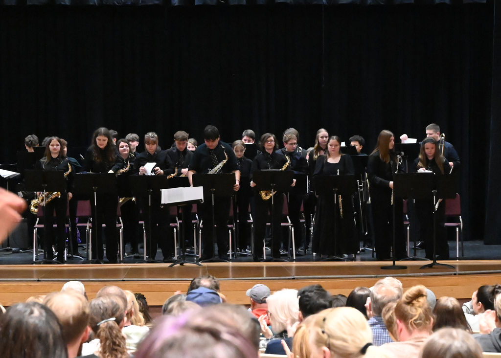 jazz band on stage taking a bow