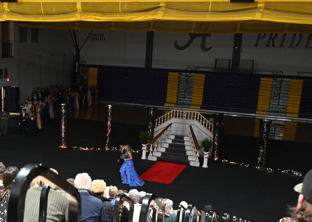 gym decorated with collums and a stairwasy