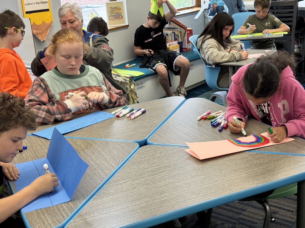 a class of students a desk drawing