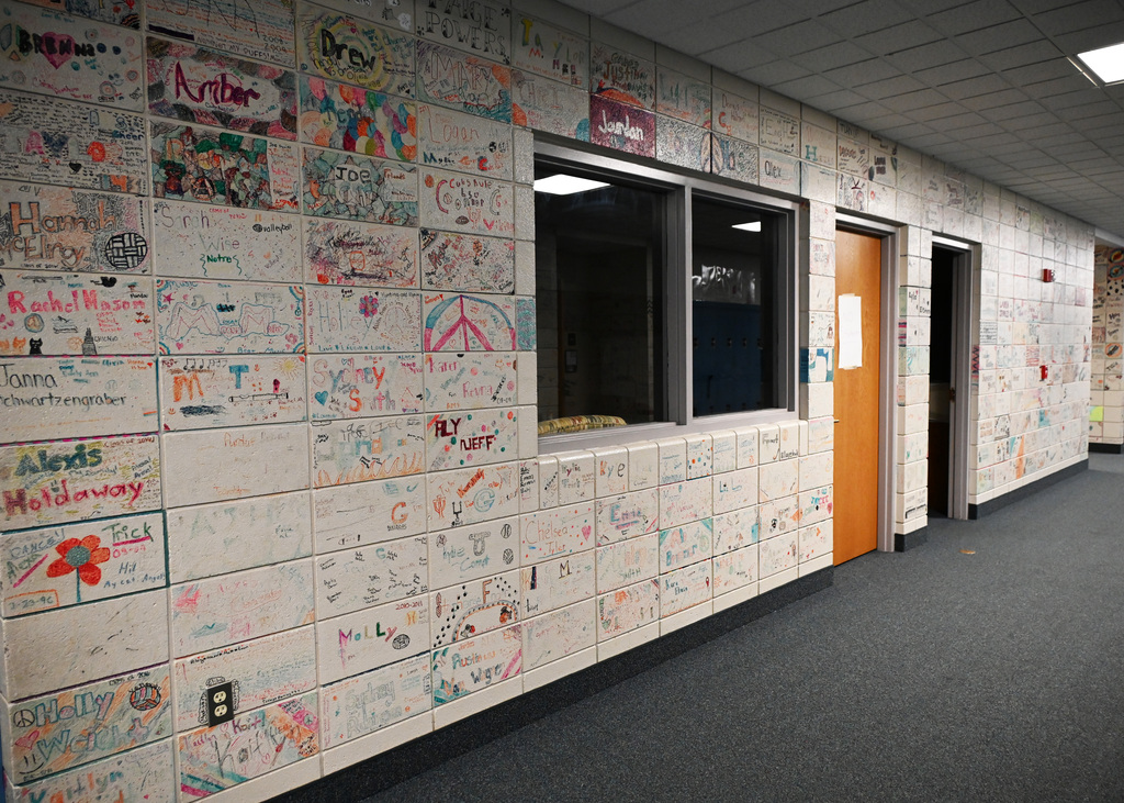 walls of a school with draings on the blocks of the walls