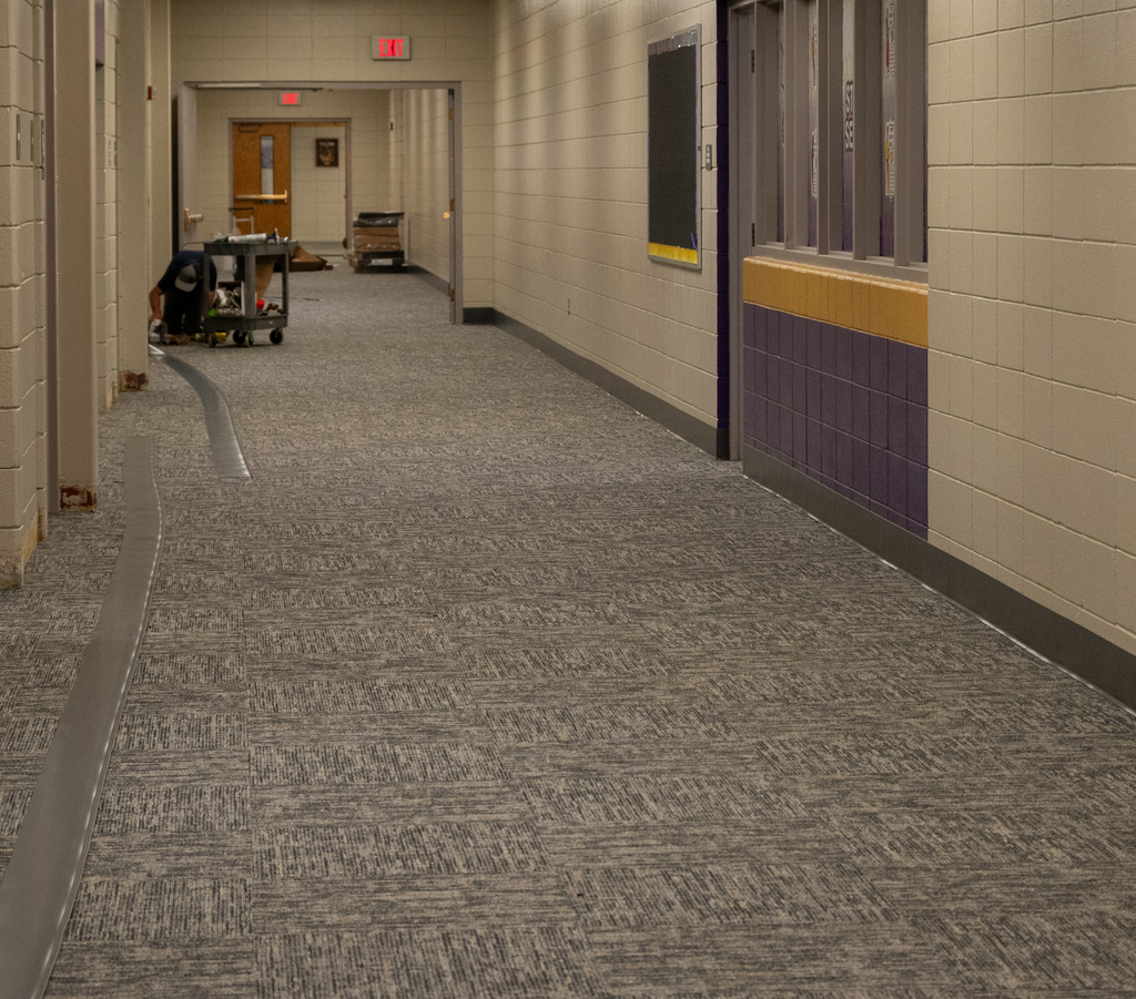hallway with edging being repaired