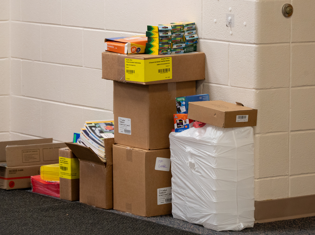 stacks of boxes of school supplies