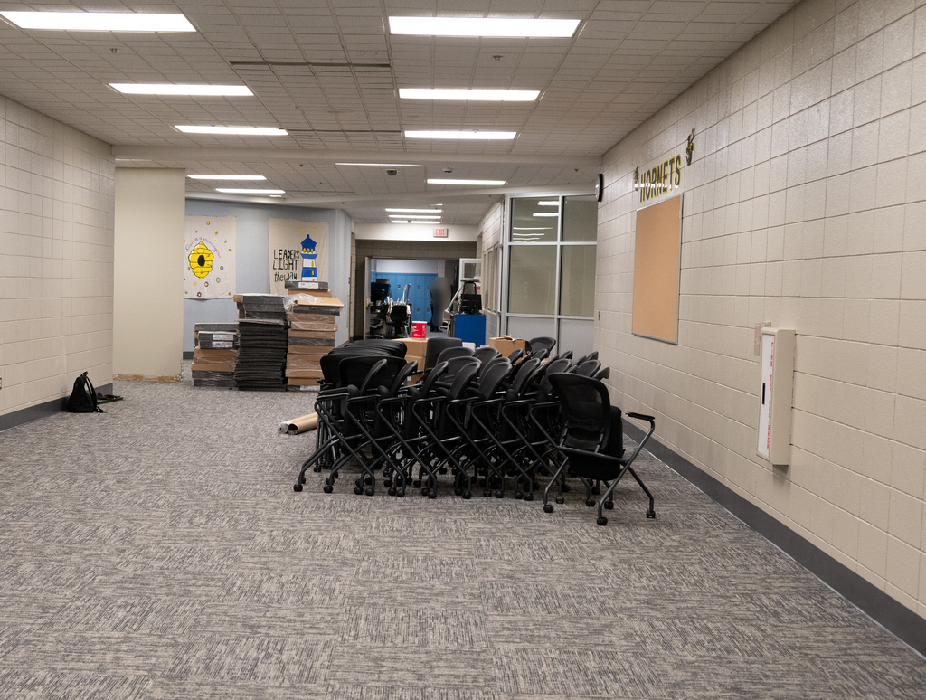 Hallway with chairs and boxes
