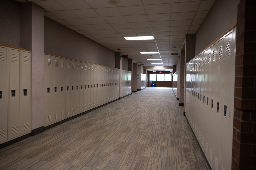 school hallway with lockers on both sides