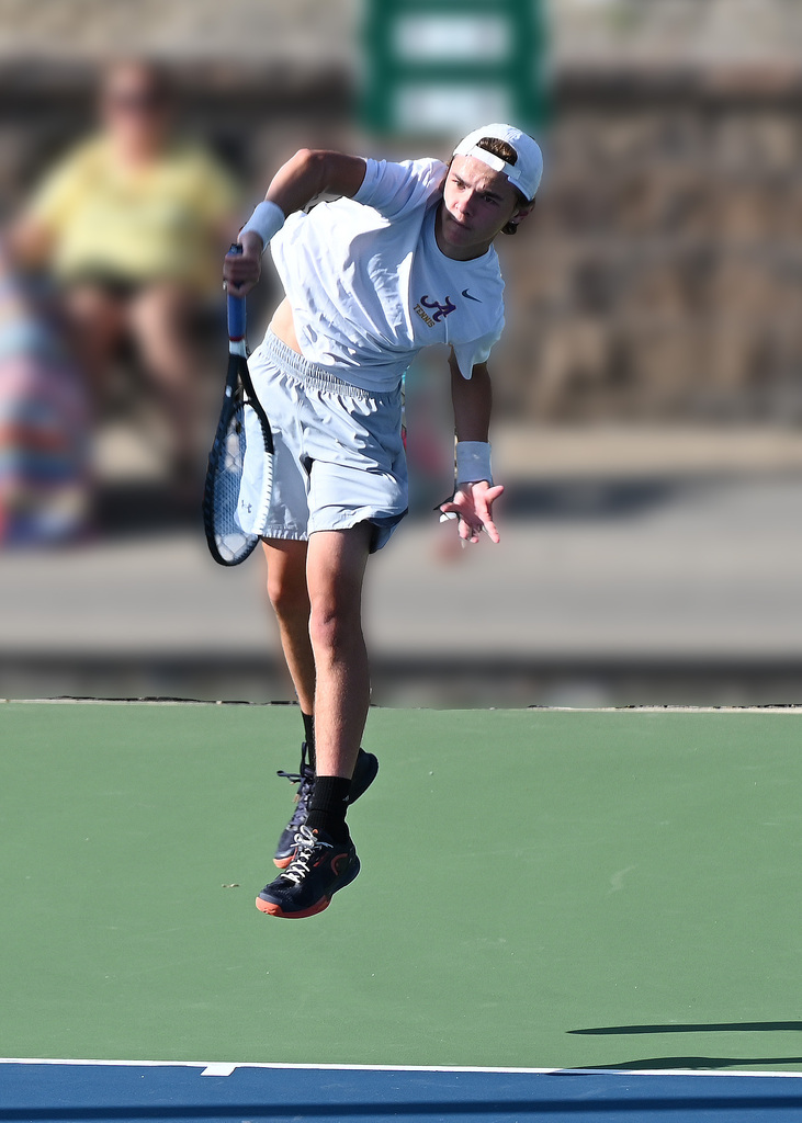 tennis player jumping